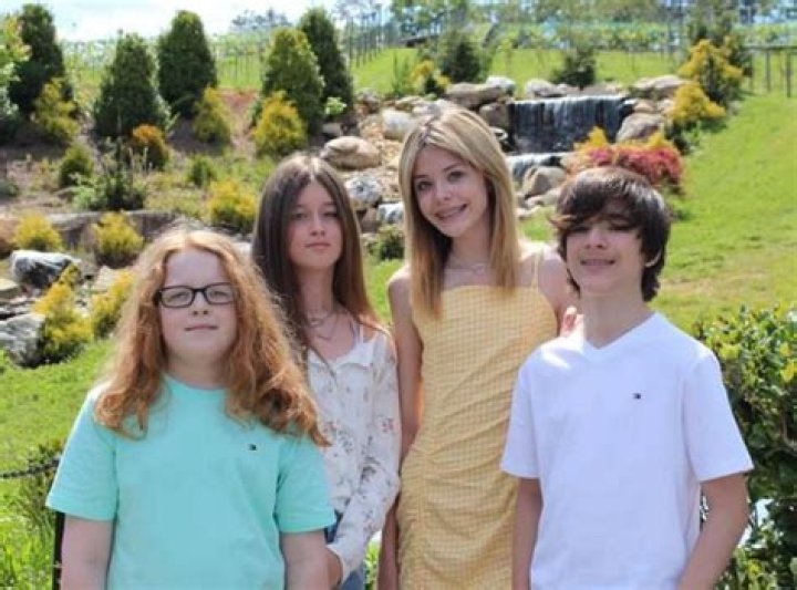 Cora Tilley with her siblings