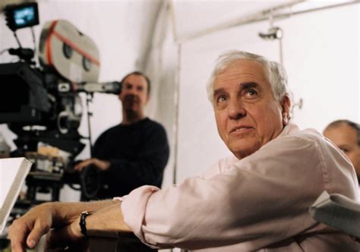 Director Garry Marshall and the cast of Young Doctors in Love (1982)