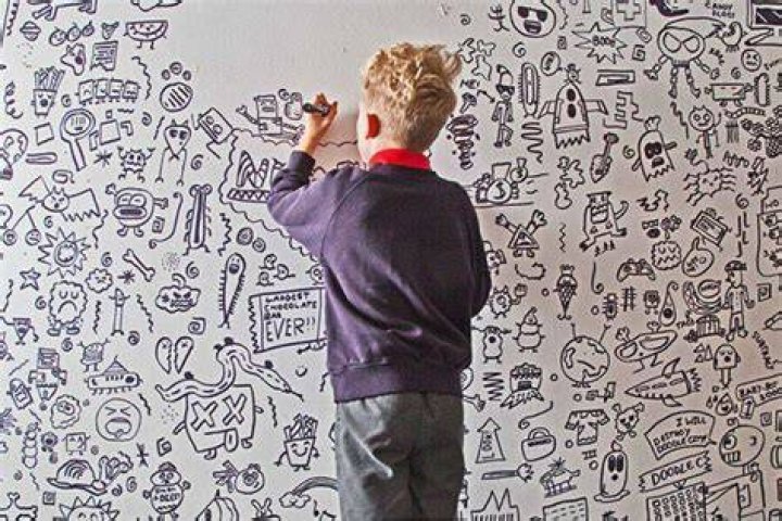 Doodle Boy Doodling On The Floor