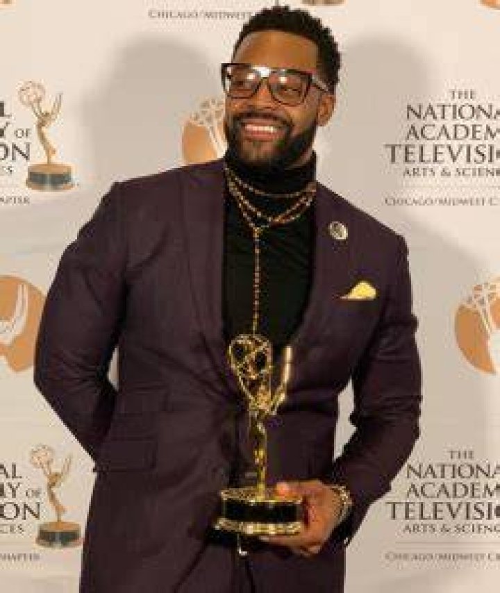 Is LaRoyce Hawkins a member of Omega Psi Phi?