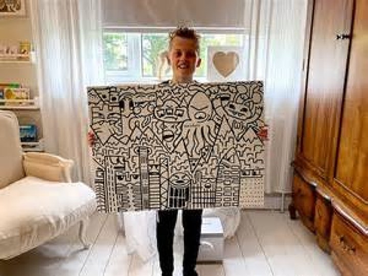Joe Whale With His Doodle Wall
