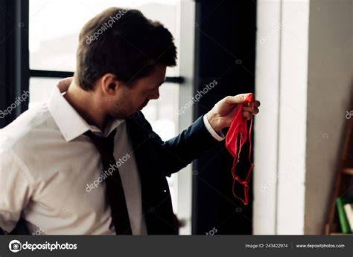 Man Looking In Underwear