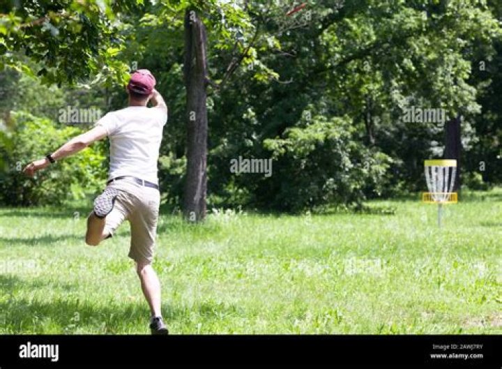 Man Playing Disc Golf