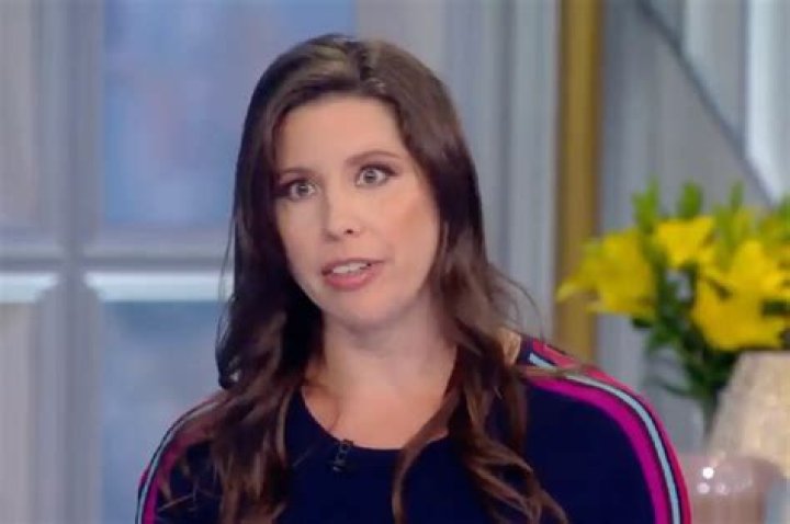 Mary Katharine Ham with her two brother and mother