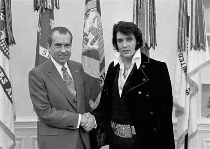 Nixon Checking Out Elvis' Cufflinks