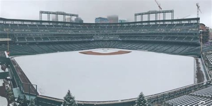 Snow covering a baseball stadium in Buffalo.