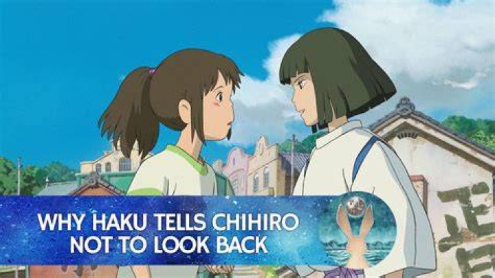 Why does Haku tell Chihiro not to look back?